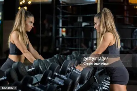 Gym Lifestyle winner staring at themselves